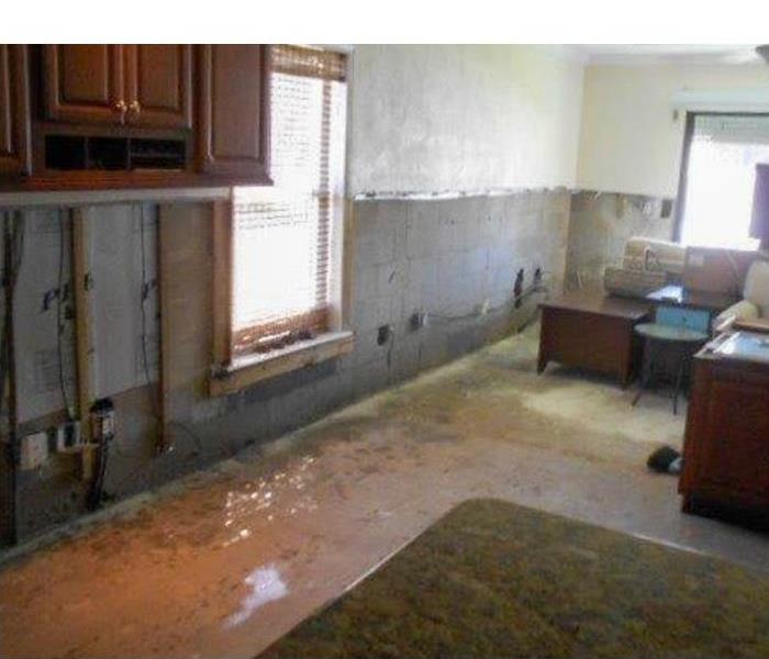 Flooded home in Waynesville, NC, drywall removed due to water damage