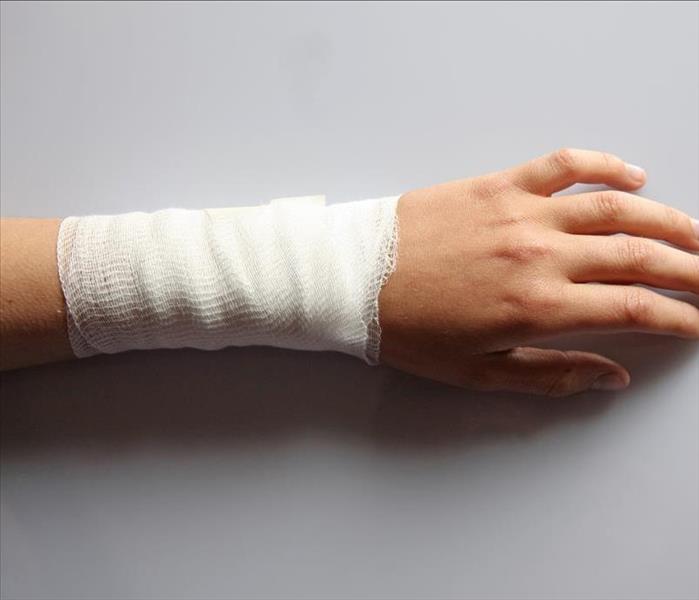 Arm with a bandage wrapped around it.